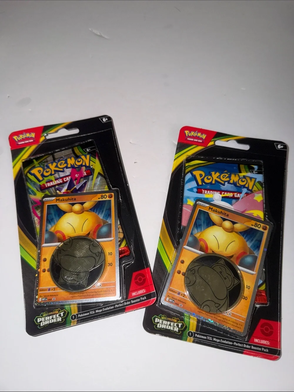 Pokemon Makuhita Gold Coin & Booster Pack - Black/Gold